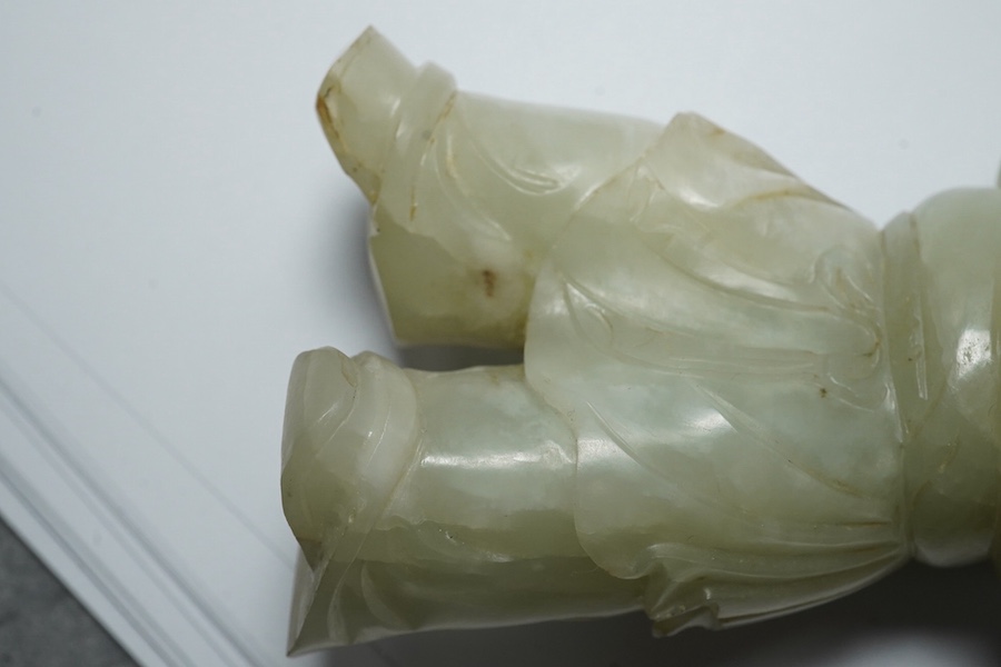 A Chinese pale celadon jade figure of a boy, 18th century